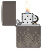 Zippo Feuerzeug Black Ice® mit Playboy Hasenköpfen und Wirbeln geöffnet mit Flamme